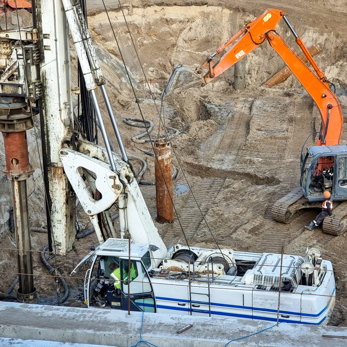 closeup-of-heavy-excavators-and-construction-machi-2025-01-07-23-15-29-utc